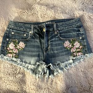 American Eagle cut-off jean shorts with embroidered flowers.  Size 8.